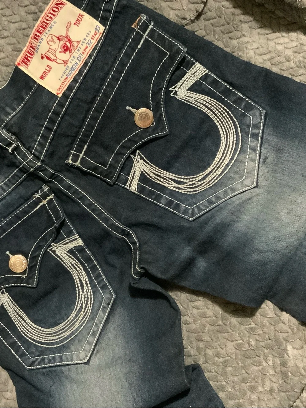 True Religion Men's Faded Blue Relaxed Jeans with Contrast Stitching